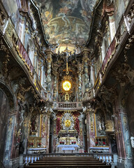Oppulent Bavarian Baroque and rococo interior style architecture inside Roman Catholic church or...