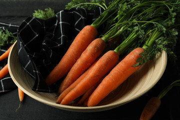 Concept of fresh vegetable with carrot on dark wooden table