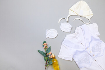 Baby concept. Baby cloth and goods on grey  background. Place for text. View from above. Flat Lay -...