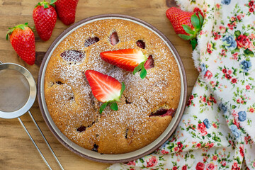 Sweet cake with fresh strawberries