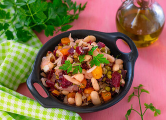 Russian traditional salad Vinegret (Vinaigrette) with beans and parsley