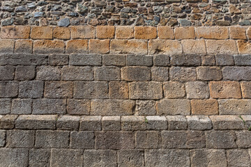 Architecture textures, granite and schist mix, medieval paired masonry wall