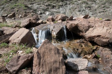 small stream of meltwater in a remote mountain region in Lebanon