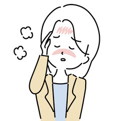 発熱で頭を抑える女性