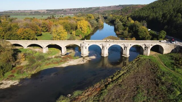 Aerial view of Nineteenth-century bridge over the Yantra River, known as the Kolyu Ficheto Bridge in Byala, Ruse region, Bulgaria