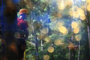 male climber rope park, outdoor activity training, guy, man extreme weekend in the forest