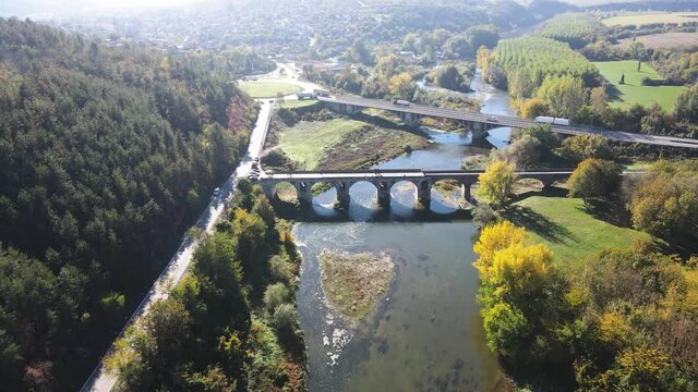 Aerial view of Nineteenth-century bridge over the Yantra River, known as the Kolyu Ficheto Bridge in Byala, Ruse region, Bulgaria