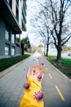 Man Hand Outside Spreading COVID-19 Virus Particles