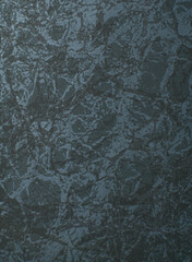 Dark marble texture with a beautiful pattern. Close. Vertical snapshot