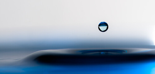 drop of water on blue background