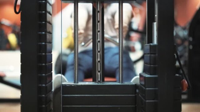 Working mechanism of weight stack in a gym trainer machine