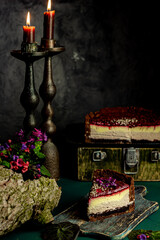 A piece of chocolate raspberry cheesecake. Homemade pastries. 