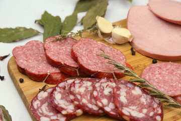 Smoked pork sausages, isolated on white background.