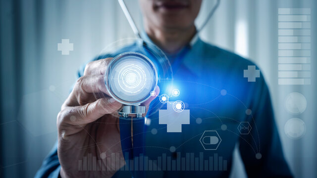 Male doctor shows stethoscope with graphic medical icon for Alert about the virus outbreak.