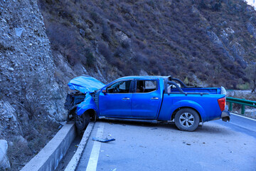 Accident pickup truck on mountain road in tibet,China