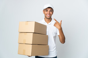 Delivery Brazilian man isolated on white background giving a thumbs up gesture