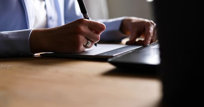 Illustrator hands scetching on tablet computer, using stylus, Creative female graphic designer draw on graphic table, working on creative project at home, Concept of modern art and technology.