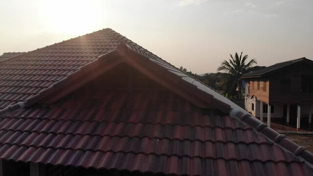 Modern brown roof of new house in suburban architech construction site aerial view