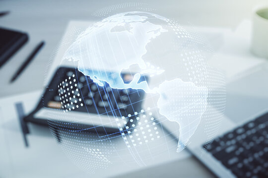 Digital map of North America hologram on blurry calculator and computer background, global technology concept. Multiexposure