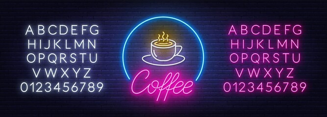Coffee neon sign on brick wall background. © TanyaFox