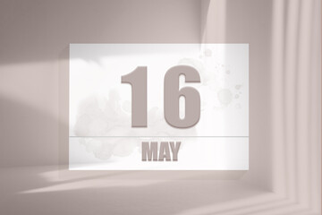 may 16. 16th day of the month, calendar date. White sheet of paper with numbers on minimalistic pink background with window shadows.Spring month, day of the year concept
