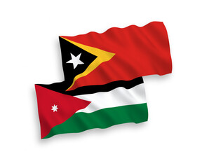 National vector fabric wave flags of Hashemite Kingdom of Jordan and East Timor isolated on white background. 1 to 2 proportion.