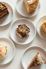 Several different fresh cakes on a white background