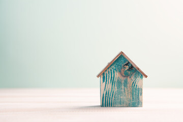 Obraz na płótnie Canvas Family care and protection insurance concept. model of a small house