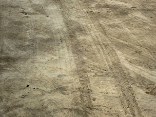 dirty cocnrete floor with stain of mark tire