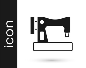 Black Sewing machine icon isolated on white background. Vector