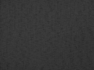 Fototapeta na wymiar smooth black fabric cloth texture, dark background