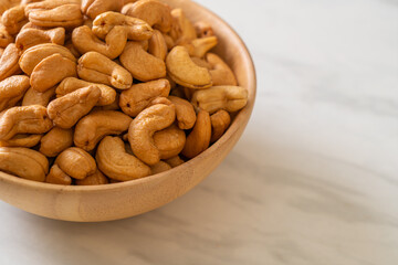 Cashew nuts in wooden bowl