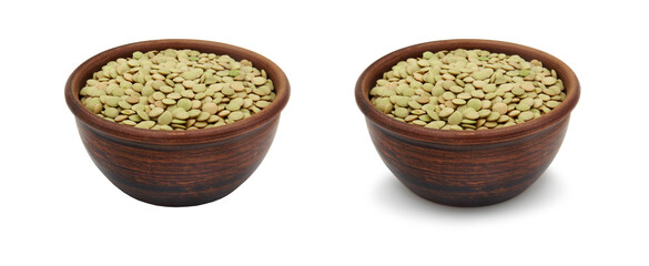 green lentils in clay bowl on white background, isolated and with shadow