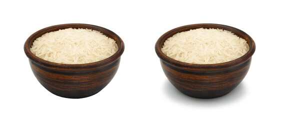 white rice in clay bowl on white background, isolated and with shadow