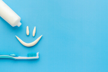 Dental hygiene concept. Smile shape with toothbrush, top view