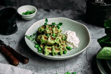 Zucchini waffles with cream cheese. Vegetarian green waffles