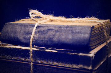 three old antique books tied with rope for gift book day apartment décor