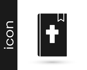 Black Holy bible book icon isolated on white background. Vector