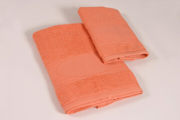 
Orange bath towel and face