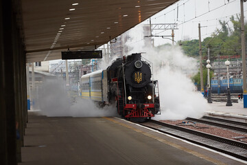 old train steam locomotive on the platform