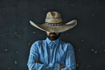 man in a hat with straw brim, hides his face, incognito guy, abstract country music style america...
