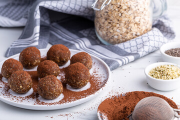 Healthy homemade power balls dessert made with oatmeal, dates, peanut butter, and other bacalias.