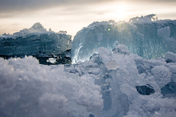 Fototapeta na wymiar ice on the lake against the backdrop of the setting sun - 4