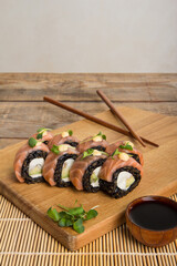 Closeup of delicious japanese food with sushi roll. Sushi menu. Japanese kitchen, restaurant.