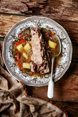 Buckwheat soup with beef ribs.style rustic