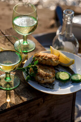 Fish patties fishing near the river. Daylight