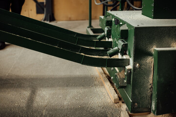 fuel briquettes on the conveyor. plant for the production of pressed environmentally friendly fuel from wood waste