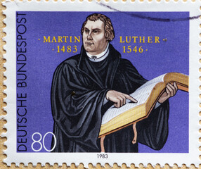 GERMANY - CIRCA 1983  : a postage stamp from Germany, showing a portrait of the reformer and theologian Martin Luther on his 500th birthday