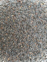 Background of wet asphalt, stones after rain