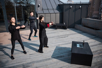 Relaxation activity in a group of three outdoors